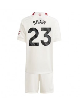 Otroški Nogometna dresi replika Manchester United Luke Shaw #23 Tretji 2023-24 Kratek rokav (+ hlače)